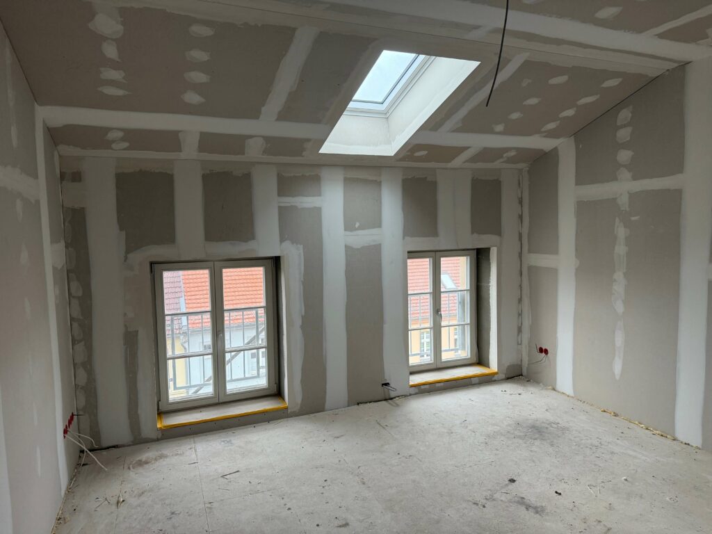 Bauring Hochbau GmbH Innenausbau Obergeschoss mit Dachfenster Neuruppin